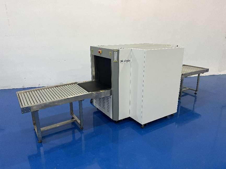 Carrier baggage inspection machine